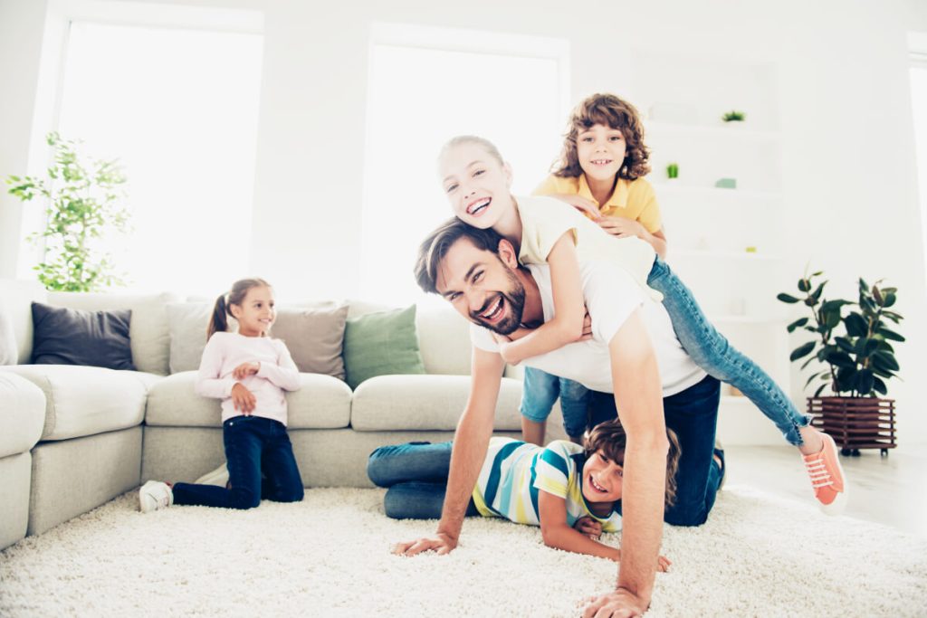 San Antonio family enjoying playing in their clean home.
